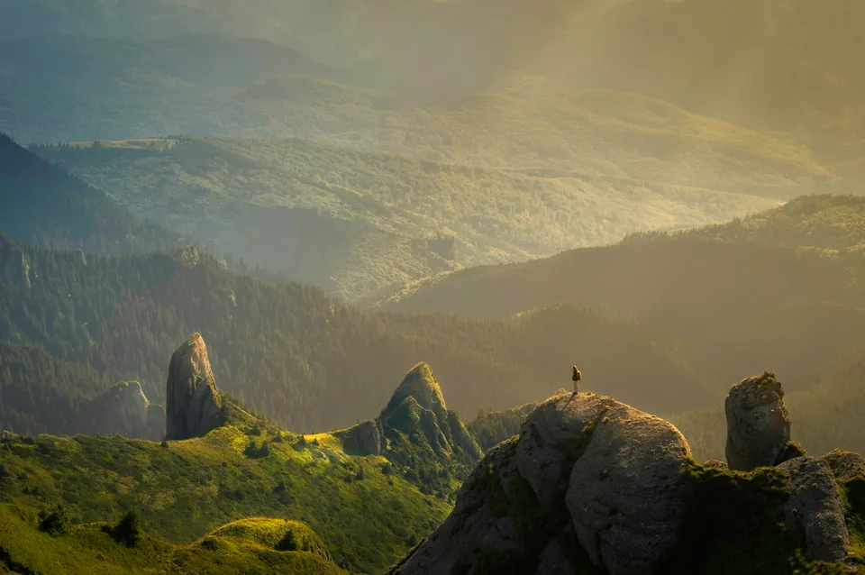 Demo image: A mountain valley under clouds. Placeholder for the MADEIRA album.