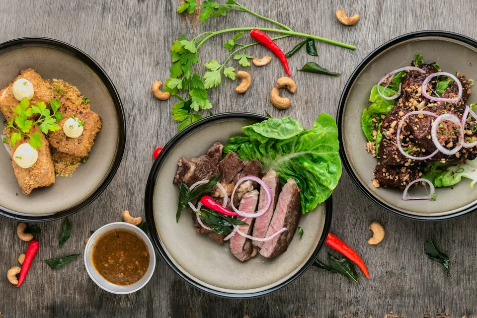 Demo image: A table filled with prepared dishes. Placeholder for the FOOD album.