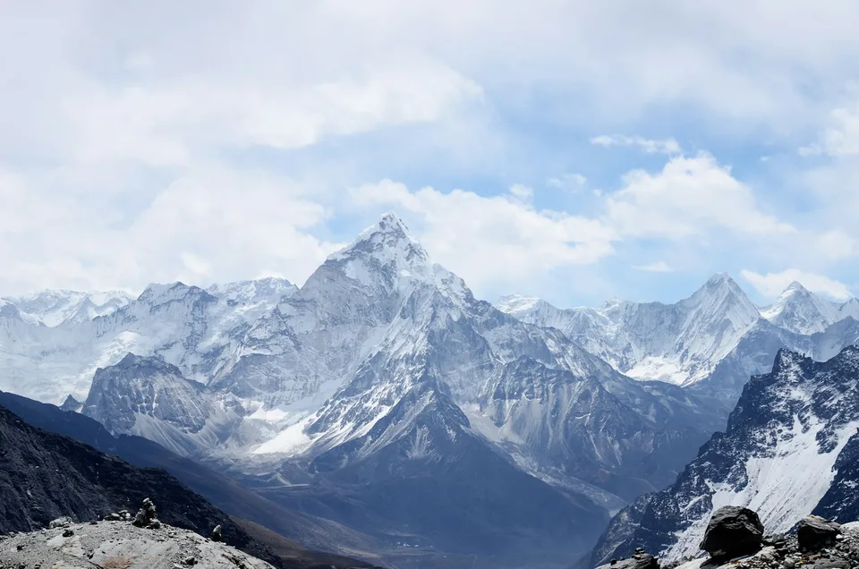 Demo image: Mountain peaks and low clouds. Placeholder for the DOLOMITES album.